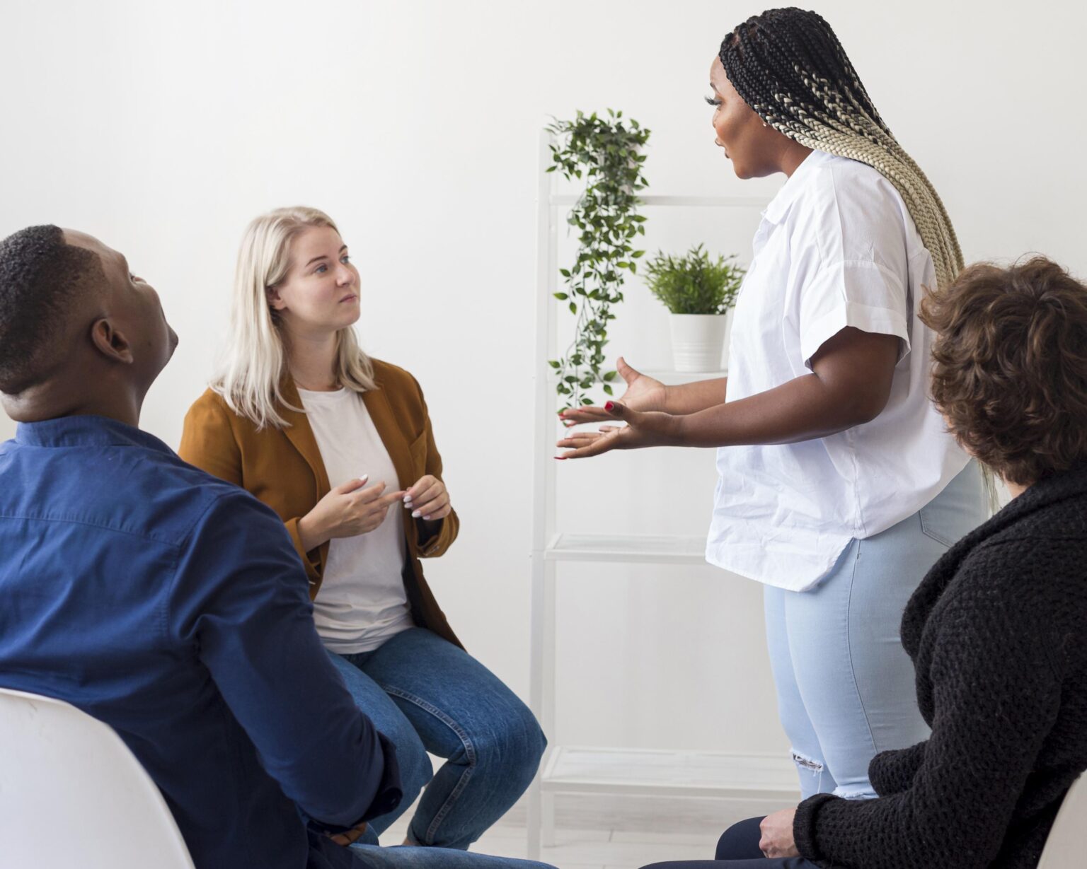 Facilitator leading a small group