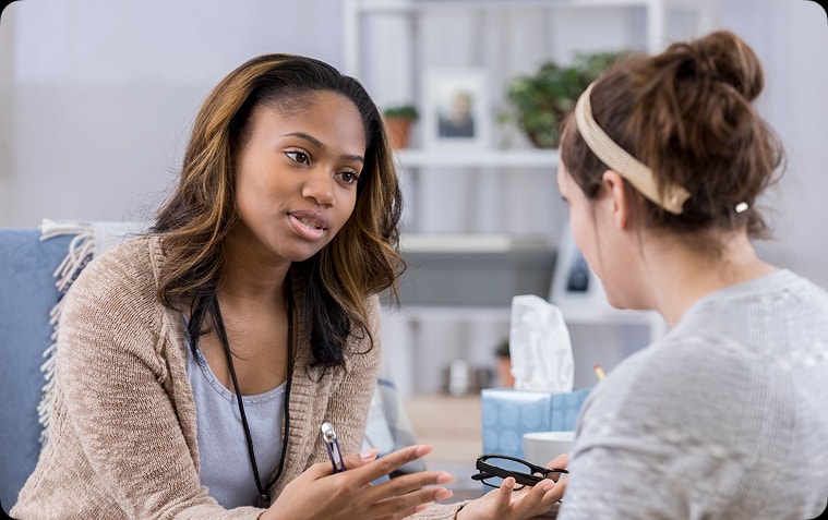 Counselor listening to a client